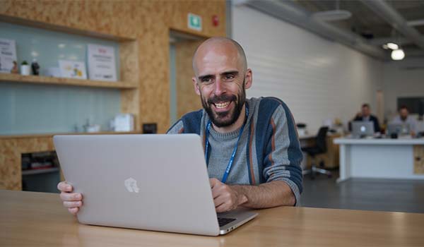 Alvaro Torres on a video call evaluating agency selection with a criteria list